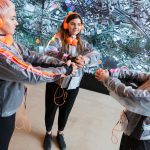 Three young woman in wearable technology and headphones perform SUPERGESTURES at the Bright Building during Future Sessions