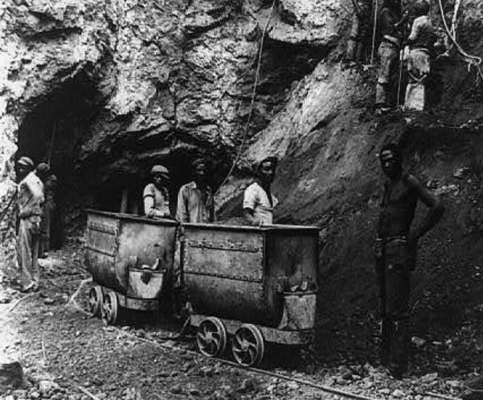 Diamond miners at the bottom of a great shaft at the Wesselton Mines, Kimberley, South Africa